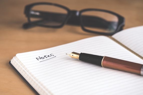 open-notebook-with-notes-written-at-the-top